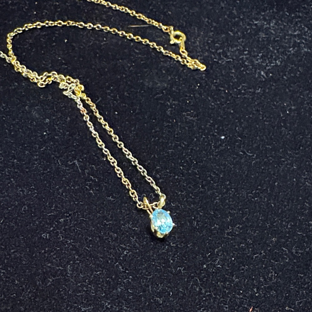 Gold Necklace with Blue Gemstone Pendant